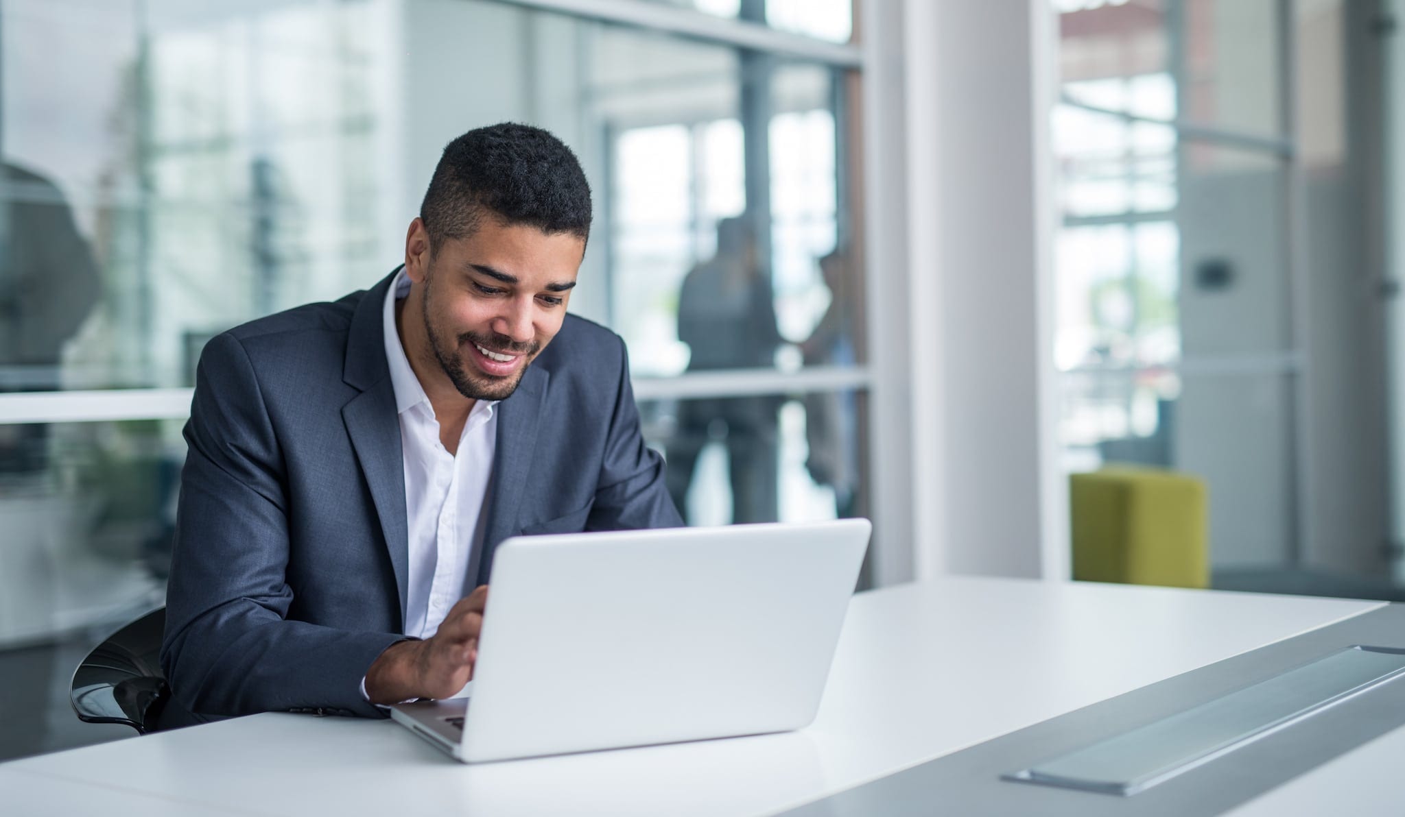 Businessman on pc stock image